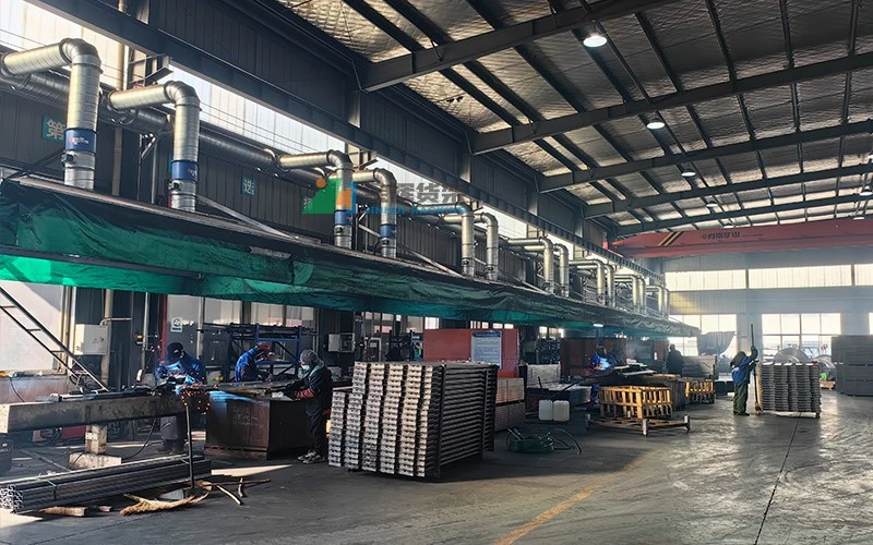 Workshop raw material area with stacked metal sheets