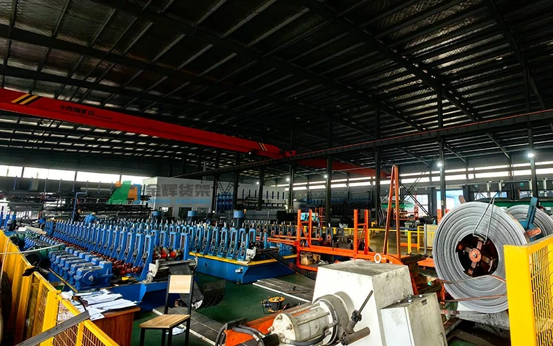 Coiled materials and automated production equipment in workshop